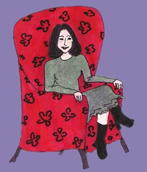 the ketuba maven herself, seated on a comfy sofa which is the ketba maven logo